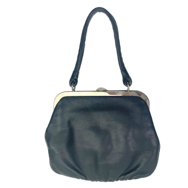 Waardevol d'Ing | taxatie | advies | tassenrestauratie | vintage | tassen | Goldpfeil